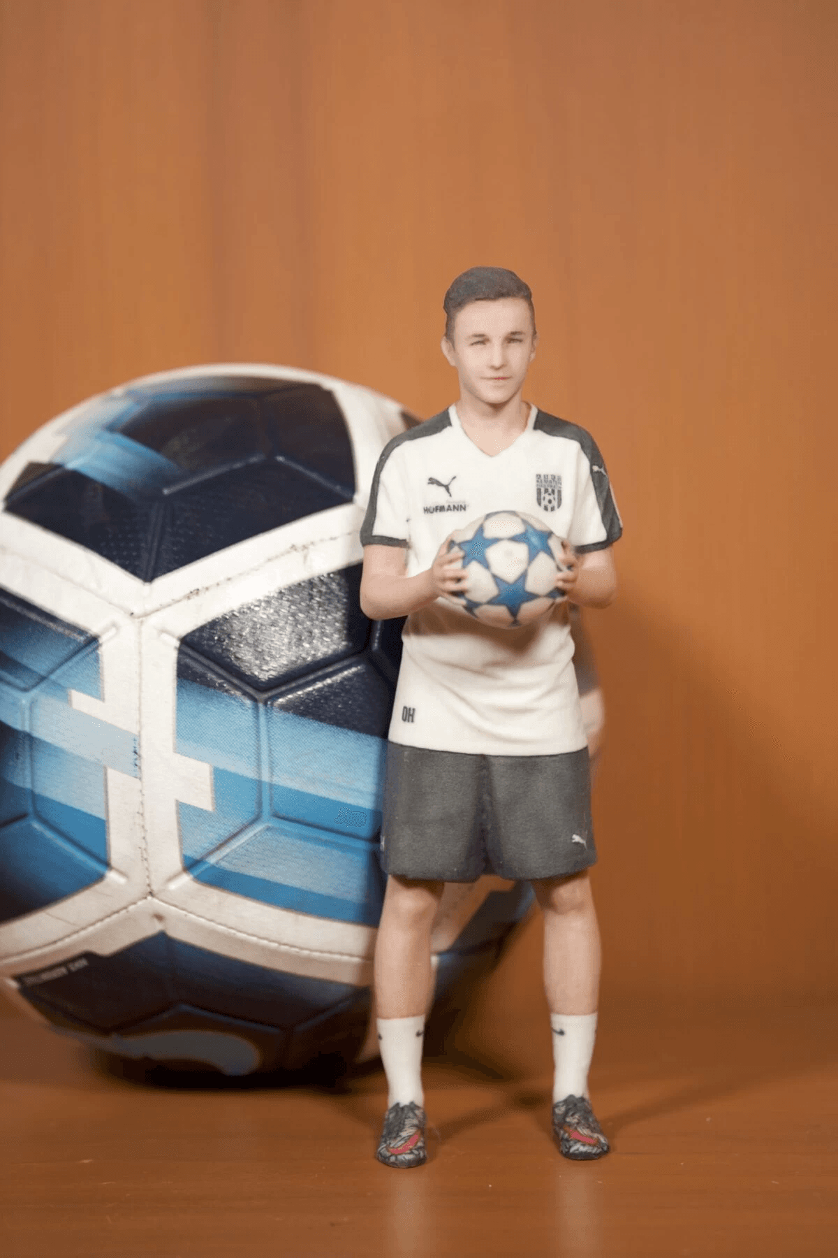 3D figurine with soccer ball